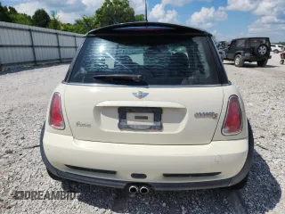 2006 MINI Hardtop S with VIN WMWRE33556TJ38543, listed as a Copart auction lot 62420145 with 105,656 mi miles and Salvage title. Bid and sale history available at DreamBid. Image 6.