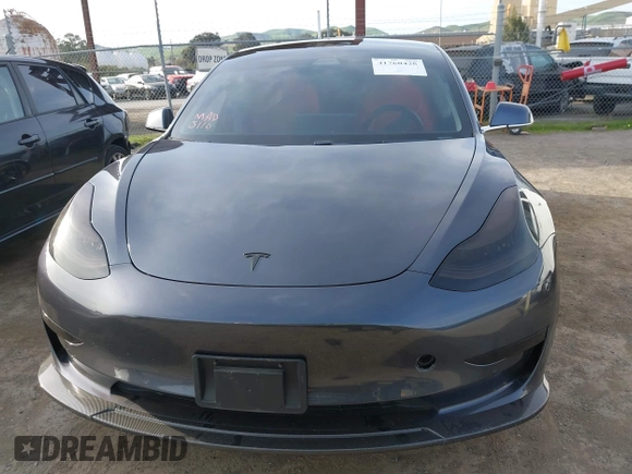 2019 Tesla Model 3 Long Range with VIN 5YJ3E1EB6KF413320, listed as a IAAI auction lot 41760428 with 90,441 mi miles and . Bid and sale history available at DreamBid. Image 11.