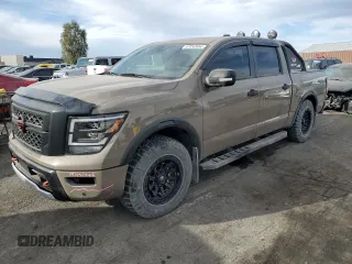 2024 Nissan Titan Pro-4X with VIN 1N6AA1ED3RN103011, listed as a Copart auction lot 87050954 with 8,829 mi miles and Salvage title. Bid and sale history available at DreamBid. Image 1.