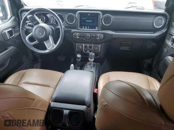 2023 Jeep Wrangler Sahara z VIN 1C4JJXP62PW553101, wystawiony jako Copart lot #56935165 z przebiegiem 28 157 mil mil oraz Szkoda całkowita • Salvage title. Historia ofert i sprzedaży dostępna na DreamBid. Obrazek 8.