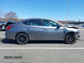 2018 Nissan Sentra SV with VIN 3N1AB7AP3JL633148, listed as a IAAI auction lot 41983588 with 148,479 mi miles and . Bid and sale history available at DreamBid. Image 13.