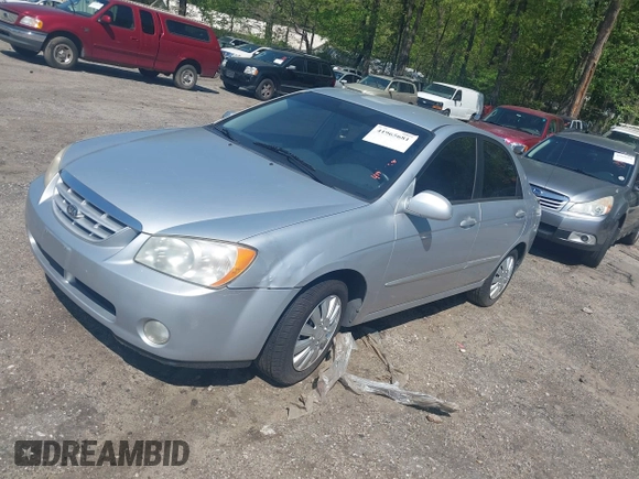 2004 Kia Spectra LX with VIN KNAFE122145037581, listed as a IAAI auction lot 41965681 with 49,817 mi miles. Bid and sale history available at carsss.com. Image 2.