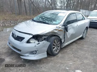 2009 Toyota Corolla with VIN 2T1BU40E69C123823, listed as a IAAI auction lot 42079964 with 204,124 mi miles. Bid and sale history available at carsss.com. Image 2.