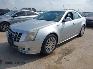 2012 Cadillac CTS Performance z VIN 1G6DJ5E37C0145221, wystawiony jako IAAI lot #42111935 z przebiegiem 82 103 mil mil oraz . Historia ofert i sprzedaży dostępna na DreamBid. Obrazek 2.