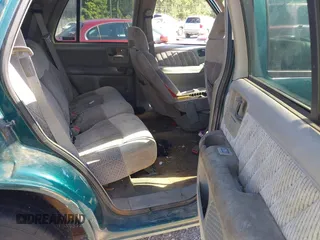 1997 GMC Jimmy SLE z VIN 1GKCS13W0V2524634, wystawiony jako IAAI lot #42196586 z przebiegiem 371 254 mil mil oraz . Historia ofert i sprzedaży dostępna na DreamBid. Obrazek 8.