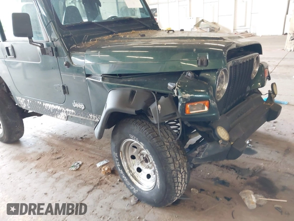 2000 Jeep Wrangler Sport with VIN 1J4FA49S8YP780104, listed as a IAAI auction lot 42095731 with Not provided miles and . Bid and sale history available at DreamBid. Image 15.