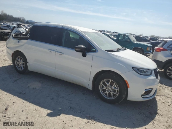 2024 Chrysler Pacifica Touring L with VIN 2C4RC1BG3RR114088, listed as a Copart auction lot 50728045 with 6,696 mi miles and Salvage Title. Bid and sale history available at carsss.com. Image 4.