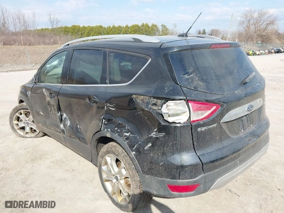 2014 Ford Escape Titanium with VIN 1FMCU9JXXEUE45634, listed as a IAAI auction lot 41840303 with 109,692 mi miles. Bid and sale history available at carsss.com. Image 3.
