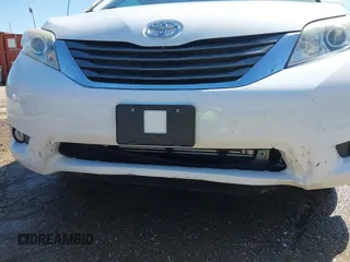 2014 Toyota Sienna XLE z VIN 5TDYK3DC7ES431782, wystawiony jako IAAI lot #41975182 z przebiegiem 191 870 mil mil oraz . Historia ofert i sprzedaży dostępna na DreamBid. Obrazek 19.