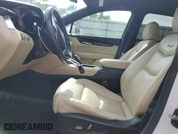 2017 Cadillac XT5 FWD with VIN 1GYKNARS0HZ157551, listed as a Copart auction lot 55281725 with 144,077 mi miles and Clean title. Bid and sale history available at DreamBid. Image 7.