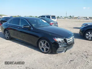 2018 Mercedes-Benz E 300 with VIN WDDZF4JB5JA380872, listed as a IAAI auction lot 42048785 with 94,574 mi miles and . Bid and sale history available at DreamBid. Image 1.