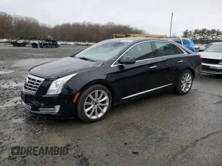 2014 Cadillac XTS Luxury with VIN 2G61M5S35E9138744, listed as a Copart auction lot 51545615 with 61,661 mi miles and Salvage Title. Bid and sale history available at carsss.com. Image 1.