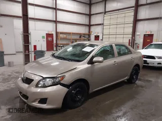 2009 Toyota Corolla with VIN 1NXBU40E19Z014460, listed as a IAAI auction lot 41973023 with 74,927 mi miles. Bid and sale history available at carsss.com. Image 2.