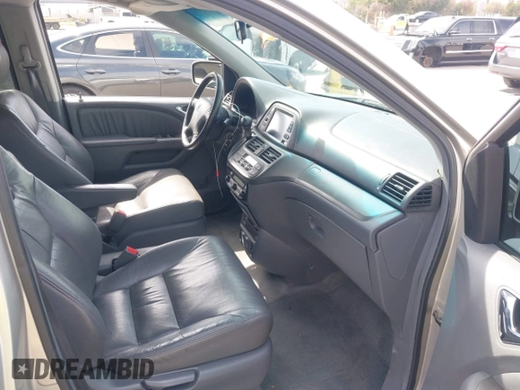 2006 Honda Odyssey EX-L z VIN 5FNRL38736B089963, wystawiony jako IAAI lot #41858061 z przebiegiem 178 845 mil mil oraz . Historia ofert i sprzedaży dostępna na DreamBid. Obrazek 5.