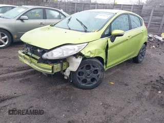 2011 Ford Fiesta SES with VIN 3FADP4FJ8BM107209, listed as a IAAI auction lot 41838522 with 142,730 mi miles. Bid and sale history available at carsss.com. Image 2.