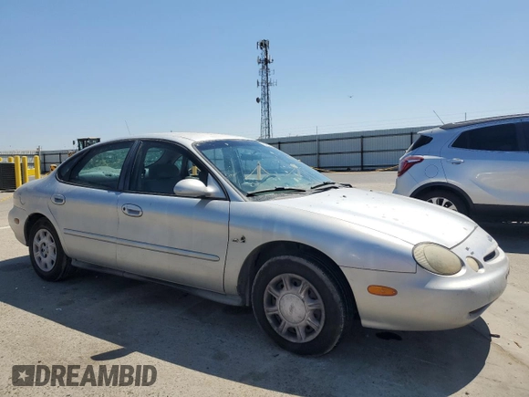1997 Ford Taurus GL with VIN 1FALP5228VG222228, listed as a Copart auction lot 64806845 with 160,397 mi miles and Salvage title. Bid and sale history available at DreamBid. Image 4.