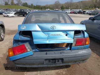 1992 Toyota Tercel z VIN JT2EL46B0N0239559, wystawiony jako IAAI lot #41890594 z przebiegiem 210 767 mil mil oraz . Historia ofert i sprzedaży dostępna na DreamBid. Obrazek 14.