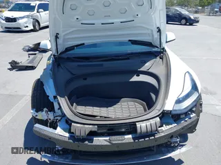 2023 Tesla Model 3 z VIN 5YJ3E1EA4PF454754, wystawiony jako IAAI lot #42665785 z przebiegiem 5 218 mil mil oraz . Historia ofert i sprzedaży dostępna na DreamBid. Obrazek 10.