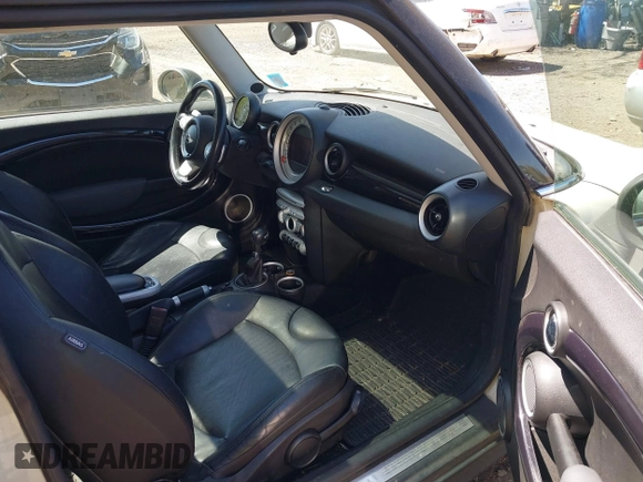 2007 MINI Hardtop with VIN WMWMF33527TT54584, listed as a IAAI auction lot 42166126 with 85,978 mi miles and . Bid and sale history available at DreamBid. Image 5.