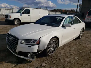 2015 Audi A8 4.0T with VIN WAUJ2AFD3FN005524, listed as a Copart auction lot 65610982 with 105,627 mi miles and . Bid and sale history available at DreamBid. Image 2.