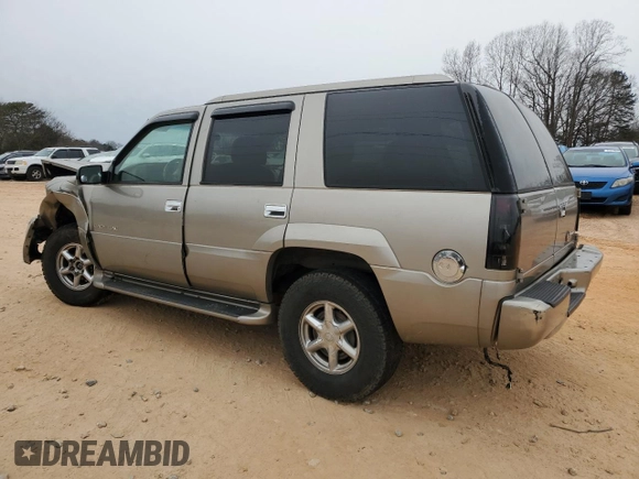 2000 Cadillac Escalade z VIN 1GYEK63R9YR218680, wystawiony jako Copart lot #87393204 z przebiegiem 295 494 mil mil oraz Szkoda całkowita • Salvage title. Historia ofert i sprzedaży dostępna na DreamBid. Obrazek 2.
