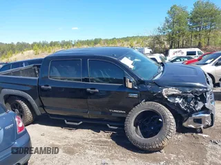 2014 Toyota Tundra 4WD Truck SR5 with VIN 5TFDW5F15EX337114, listed as a IAAI auction lot 41734727 with 209,163 mi miles. Bid and sale history available at carsss.com. Image 13.