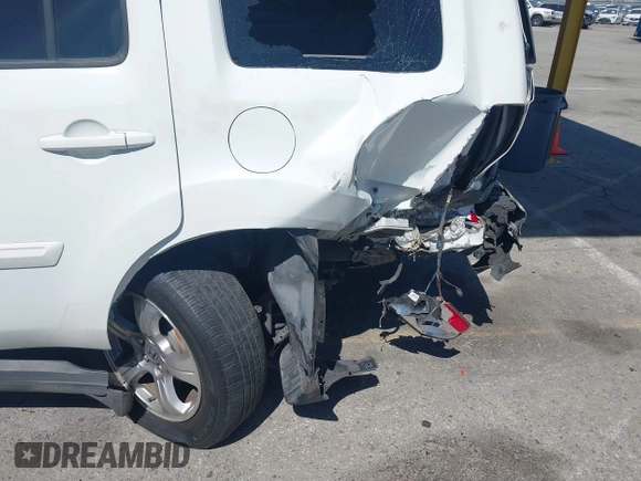 2013 Honda Pilot EX-L with VIN 5FNYF3H51DB013964, listed as a IAAI auction lot 41831598 with 155,959 mi miles and . Bid and sale history available at DreamBid. Image 6.