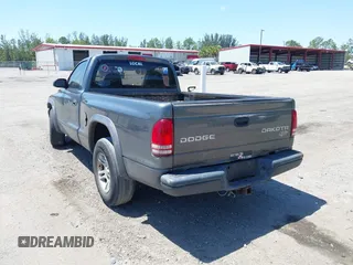 2003 Dodge Dakota with VIN 1D7FL16X53S361797, listed as a IAAI auction lot 42056555 with 243,771 mi miles and . Bid and sale history available at carsss.com. Image 12.