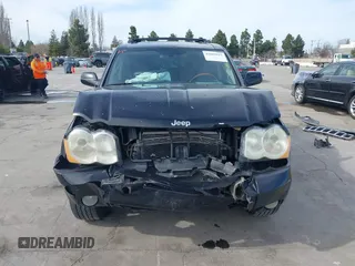 2009 Jeep Grand Cherokee with VIN 1J8HS68T49C524111, listed as a IAAI auction lot 41605917 with 133,441 mi miles and . Bid and sale history available at DreamBid. Image 13.