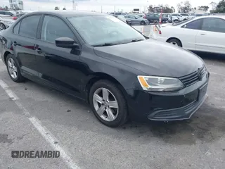 2014 Volkswagen Jetta Sedan S with VIN 3VW2K7AJ4EM442607, listed as a IAAI auction lot 42050094 with 148,664 mi miles. Bid and sale history available at carsss.com. Image 1.