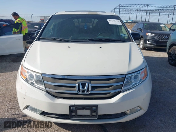 2012 Honda Odyssey Touring with VIN 5FNRL5H93CB125241, listed as a IAAI auction lot 42299053 with 125,549 mi miles and . Bid and sale history available at DreamBid. Image 12.
