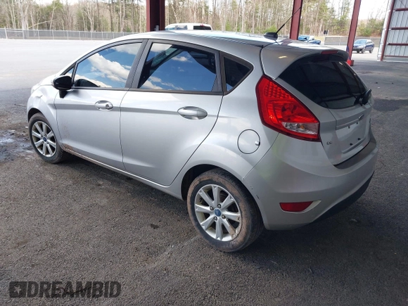 2013 Ford Fiesta SE with VIN 3FADP4EJ2DM173842, listed as a IAAI auction lot 42048262 with 82,637 mi miles. Bid and sale history available at carsss.com. Image 3.