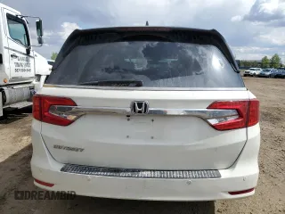 2018 Honda Odyssey EX-L z VIN 5FNRL6H68JB508942, wystawiony jako Copart lot #57323725 z przebiegiem 106 083 mil mil oraz Czysty tytuł • Clean title. Historia ofert i sprzedaży dostępna na DreamBid. Obrazek 6.