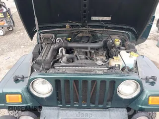 1999 Jeep Wrangler Sahara with VIN 1J4FY49S5XP482037, listed as a IAAI auction lot 42341723 with 161,081 mi miles and . Bid and sale history available at DreamBid. Image 10.