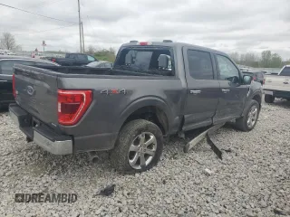2023 Ford F-150 XL with VIN 1FTEW1EP8PKF20042, listed as a Copart auction lot 55163335 with 26,870 mi miles and Salvage title. Bid and sale history available at DreamBid. Image 3.