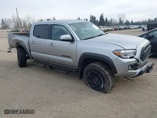 2023 Toyota Tacoma 4WD SR with VIN 3TMCZ5AN6PM608283, listed as a IAAI auction lot 41468377 with 15,046 mi miles. Bid and sale history available at carsss.com. Image 1.