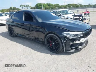 2020 BMW M5 z VIN WBSJF0C01LCD44028, wystawiony jako IAAI lot #41794919 z przebiegiem 71 008 mil mil oraz . Historia ofert i sprzedaży dostępna na DreamBid. Obrazek 1.