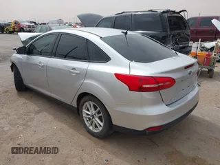 2016 Ford Focus SE with VIN 1FADP3F20GL338536, listed as a IAAI auction lot 41812805 with 130,943 mi miles. Bid and sale history available at carsss.com. Image 3.