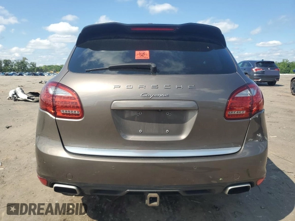 2011 Porsche Cayenne with VIN WP1AA2A28BLA04200, listed as a Copart auction lot 56824575 with 180,123 mi miles and Salvage title. Bid and sale history available at DreamBid. Image 6.