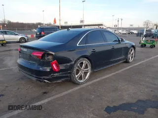 2015 Audi S8 with VIN WAUK2AFD5FN027013, listed as a IAAI auction lot 41456289 with 77,877 mi miles. Bid and sale history available at carsss.com. Image 4.