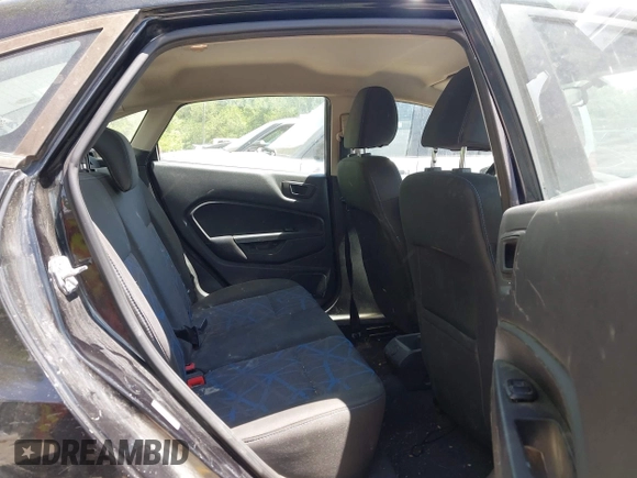 2013 Ford Fiesta SE z VIN 3FADP4BJ7DM144261, wystawiony jako IAAI lot #42281950 z przebiegiem 149 437 mil mil oraz . Historia ofert i sprzedaży dostępna na DreamBid. Obrazek 8.