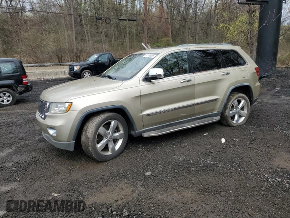 2012 Jeep Grand Cherokee Overland with VIN 1C4RJECT2CC146300, listed as a Copart auction lot 51774655 with 91,947 mi miles and Salvage Title. Bid and sale history available at carsss.com. Image 1.