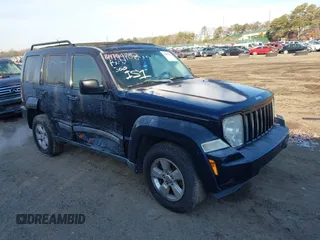 2011 Jeep Liberty Sport z VIN 1J4PN2GK2BW571471, wystawiony jako IAAI lot #41199106 z przebiegiem 144 037 mil mil oraz . Historia ofert i sprzedaży dostępna na DreamBid. Obrazek 1.