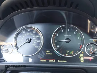 2014 BMW 5 Series 535i with VIN WBA5B1C54ED480604, listed as a IAAI auction lot 41779941 with 146,569 mi miles. Bid and sale history available at carsss.com. Image 7.