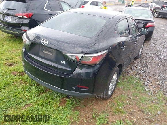 2016 Scion iA with VIN 3MYDLBZV6GY113214, listed as a IAAI auction lot 42113255 with 182,175 mi miles. Bid and sale history available at carsss.com. Image 4.