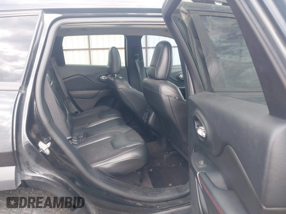 2016 Jeep Cherokee Trailhawk with VIN 1C4PJMBS4GW169267, listed as a IAAI auction lot 42597291 with 79,258 mi miles and . Bid and sale history available at DreamBid. Image 8.