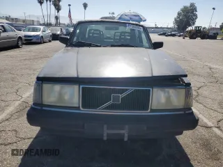 1993 Volvo 240 with VIN YV1AS8807P1483020, listed as a Copart auction lot 61060095 with 131,000 mi miles and Salvage title. Bid and sale history available at DreamBid. Image 5.