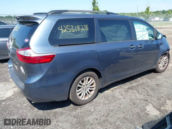 2015 Toyota Sienna XLE with VIN 5TDYK3DC0FS649998, listed as a IAAI auction lot 42531828 with 111,539 mi miles and . Bid and sale history available at DreamBid. Image 4.