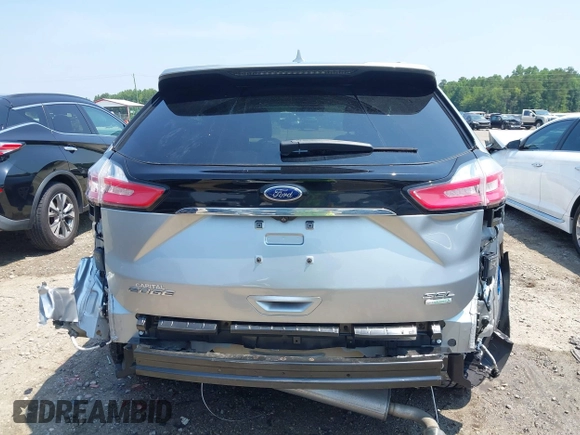 2020 Ford Edge SEL with VIN 2FMPK3J98LBA83828, listed as a IAAI auction lot 42585669 with 60,704 mi miles and . Bid and sale history available at DreamBid. Image 17.
