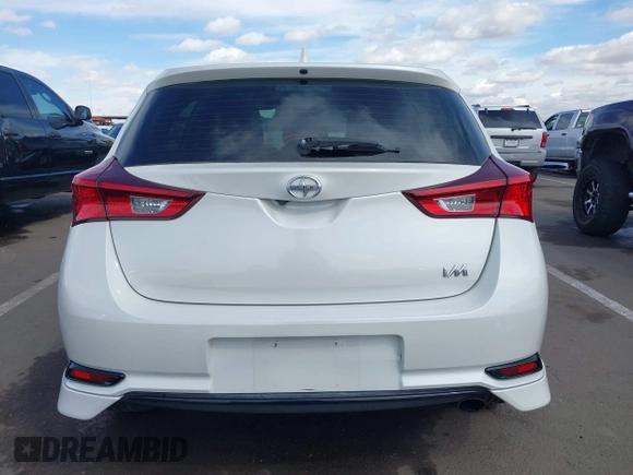 2016 Scion iM with VIN JTNKARJE4GJ517791, listed as a IAAI auction lot 41806605 with 140,956 mi miles. Bid and sale history available at carsss.com. Image 16.